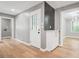 Hallway featuring updated fixtures, fresh paint, new flooring, and modern design elements at 3387 Oak Dr, Lawrenceville, GA 30044