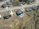 An aerial view showcasing a home with a sparkling pool, and is surrounded by trees and lush landscaping at 270 Blue Point Pkwy, Fayetteville, GA 30215
