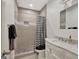 Chic bathroom with tiled shower, modern fixtures, and elegant vanity for a spa-like experience at 270 Blue Point Pkwy, Fayetteville, GA 30215