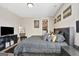 Comfortable bedroom with a king bed, plush bedding, and a stylish closet at 270 Blue Point Pkwy, Fayetteville, GA 30215