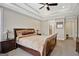 Comfortable bedroom with a luxurious bed, soft lighting, and a serene color palette at 270 Blue Point Pkwy, Fayetteville, GA 30215