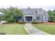 Exterior view of the community clubhouse with a sidewalk leading to the front entrance at 270 Blue Point Pkwy, Fayetteville, GA 30215