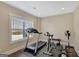 Bright exercise room with large window and essential equipment for a complete workout at 270 Blue Point Pkwy, Fayetteville, GA 30215