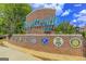 The Fayetteville welcome sign, which proudly displays local organizations and emblems at 270 Blue Point Pkwy, Fayetteville, GA 30215