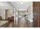 The foyer leads to a light-filled living room featuring hardwood floors and elegant decor at 270 Blue Point Pkwy, Fayetteville, GA 30215