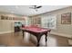Entertaining game room with pool table, comic book art, and recreational space for fun and leisure at 270 Blue Point Pkwy, Fayetteville, GA 30215