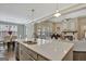 Bright kitchen with white counters open to the living room and dining area, great for entertaining at 270 Blue Point Pkwy, Fayetteville, GA 30215