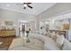 Open-concept living room flowing into a modern kitchen with a large island at 270 Blue Point Pkwy, Fayetteville, GA 30215