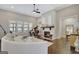 Comfortable living room with a cozy fireplace, piano, and ample seating at 270 Blue Point Pkwy, Fayetteville, GA 30215