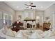 Bright living room with a fireplace, piano, and an open layout at 270 Blue Point Pkwy, Fayetteville, GA 30215