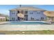 Beautiful backyard pool with a spacious patio, ideal for relaxation and entertaining at 270 Blue Point Pkwy, Fayetteville, GA 30215