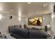 A cozy theater room with a large screen, comfortable seating, and surround sound speakers at 270 Blue Point Pkwy, Fayetteville, GA 30215