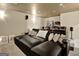 Spacious theater room with a large sectional, plush carpet, and sound system, perfect for movie nights at 270 Blue Point Pkwy, Fayetteville, GA 30215