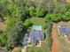 Sprawling estate featuring lush greenery, backyard pool, and private driveway at 249 Suffolk Way, Mcdonough, GA 30252