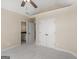 Neutral bedroom with an ensuite bathroom access, closet, and neutral carpet at 249 Suffolk Way, Mcdonough, GA 30252