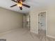 Bedroom with neutral walls, carpeted floors, and an en suite bathroom at 249 Suffolk Way, Mcdonough, GA 30252