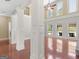 Bright and airy living room with hardwood floors, fireplace, and lots of windows with a view at 249 Suffolk Way, Mcdonough, GA 30252