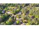 Expansive aerial view of a charming neighborhood with lush greenery and well-maintained homes at 105 Hartford Pl, Fayetteville, GA 30214