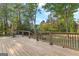 The home features a spacious wooden deck perfect for enjoying the outdoors at 105 Hartford Pl, Fayetteville, GA 30214