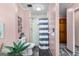 Bright bathroom featuring a toilet, shower with black and white curtain, and modern finishes at 105 Hartford Pl, Fayetteville, GA 30214