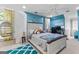 Bright bedroom with unique hanging chair, blue accent wall, and ample lighting at 105 Hartford Pl, Fayetteville, GA 30214