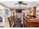 Stylish game room with a wooden bar, comfortable seating, and a flat-screen TV for entertainment at 105 Hartford Pl, Fayetteville, GA 30214