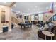 Large game room includes a pool table, stairs to another level, and lounge seating at 105 Hartford Pl, Fayetteville, GA 30214