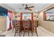 Inviting game room featuring a built-in bar, comfortable bar stools, and entertainment options at 105 Hartford Pl, Fayetteville, GA 30214