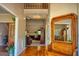 Inviting foyer with hardwood floors, high ceilings, and a glimpse into the living room at 1730 Carlington Ct, Grayson, GA 30017