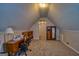 Spacious home office with desk, bookcases, and comfortable seating at 1730 Carlington Ct, Grayson, GA 30017