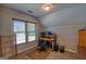 Comfortable home office featuring ample lighting and adequate desk space at 1730 Carlington Ct, Grayson, GA 30017