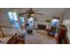 Bright living room with fireplace and large windows that offer plenty of natural light at 1730 Carlington Ct, Grayson, GA 30017