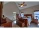 Warm and inviting main bedroom with a vaulted ceiling, hardwood furniture, and natural light at 1730 Carlington Ct, Grayson, GA 30017