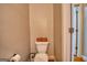 Cozy bathroom with white toilet, and basket for added comfort at 1730 Carlington Ct, Grayson, GA 30017