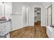 Bathroom features hardwood flooring, vanity, and a glass-enclosed shower, creating a clean and modern space at 3139 Players Dr, Jonesboro, GA 30236
