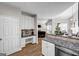 Bright kitchen with view into breakfast area and fireplace at 3139 Players Dr, Jonesboro, GA 30236