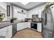 Kitchen featuring stainless steel appliances and granite countertops at 3139 Players Dr, Jonesboro, GA 30236