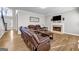 View of the living room featuring a fireplace, recliners, and bright, natural light at 3139 Players Dr, Jonesboro, GA 30236