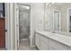 Bathroom featuring a white vanity, tile floor, and a shower/tub combo with shower curtain at 1109 Allen Rd, Grantville, GA 30220