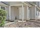 Inviting entryway with covered porch, showing the front door and neutral siding at 1109 Allen Rd, Grantville, GA 30220
