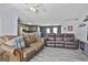 Spacious living room with open layout, seamlessly connected to the kitchen and dining areas at 1109 Allen Rd, Grantville, GA 30220