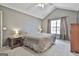 Cozy main bedroom with vaulted ceilings, carpet, a big window and neutral walls at 1109 Allen Rd, Grantville, GA 30220
