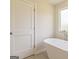 Modern bathroom featuring a freestanding tub next to a window at 502 Alford Cv # 91, Fairburn, GA 30213