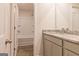 Bathroom featuring a granite countertop vanity and a shower-tub combination at 502 Alford Cv # 91, Fairburn, GA 30213