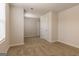 Spacious bedroom with neutral walls, carpet flooring, and natural light at 502 Alford Cv # 91, Fairburn, GA 30213