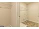 A laundry room with wire shelving and vinyl flooring at 502 Alford Cv # 91, Fairburn, GA 30213