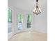 Bright eat-in kitchen area with bay window and french door at 385 Lakeshore Dr, Stockbridge, GA 30281