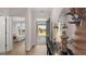 Welcoming entryway featuring a decorative console table and access to the bedroom at 591 Parnassus Rd, Locust Grove, GA 30248