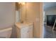 Bathroom featuring a white vanity with granite counter tops, modern sink and a large mirror at 1461 Thomas St, Conyers, GA 30094