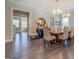 Dining room featuring hardwood floors, chandelier lighting, and elegant decor at 1461 Thomas St, Conyers, GA 30094